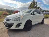 Opel Corsa D lift 2013 biały z474 błotnik drzwi klapa zderzak