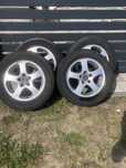 Cztery felgi 15 aluminiowe z oponami saab 93