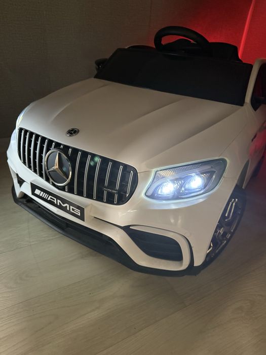 Дитяча машинка электромобиль