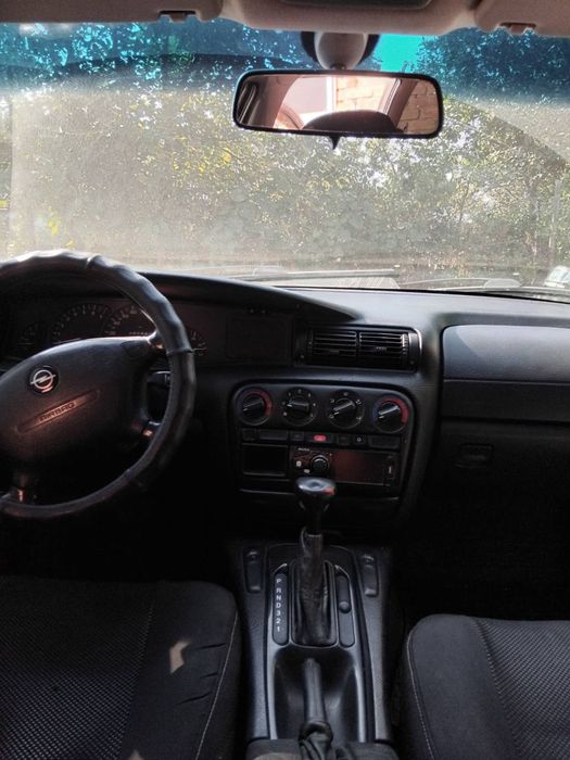 Opel Omega B,2,5 газ/бензин.