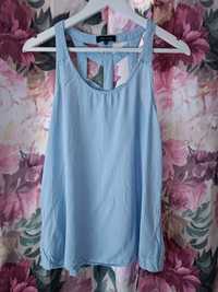 Błękitny top oversize baby blue z efektownym tyłem