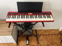 Teclado Roland GO:KEYS + suporte + banco + pedal + estante partituras