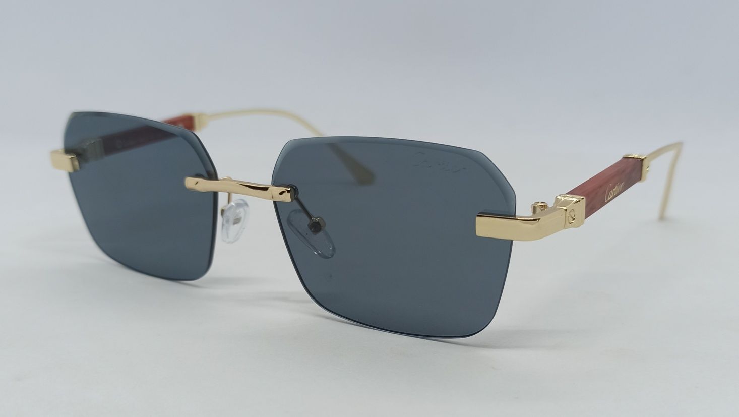 Cartier очки унисекс стильные узкие чёрные с золотым металлом