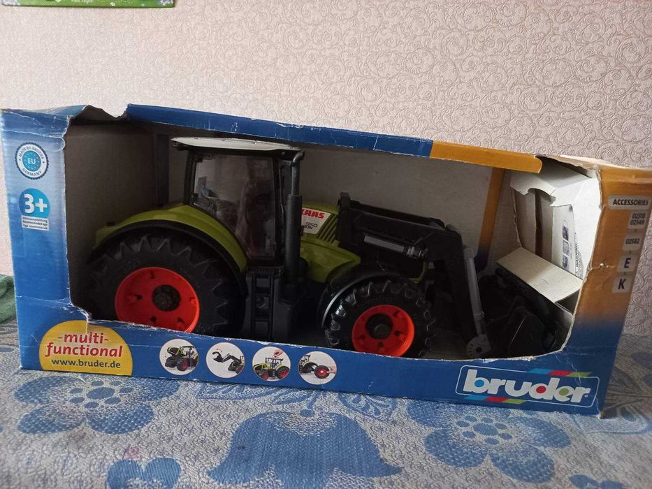 Спецтехніка Bruder трактор Claas Axion 950 з навантажувачем
