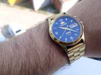 Złoty w czerni zegarek orient crystal ni seiko citizen tissot certina