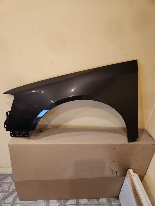 Passat B6 05-10 błotnik lewy nowy LC8Z ocynk