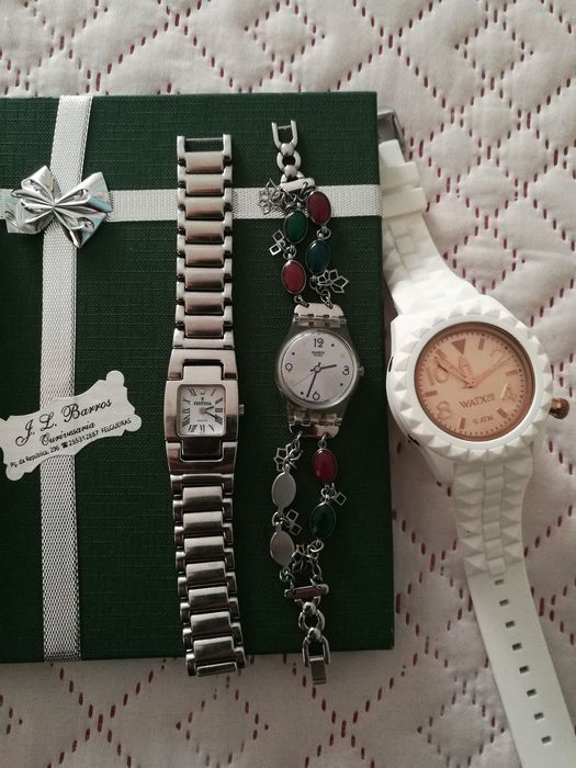 2 relógios de senhora swatch e festina