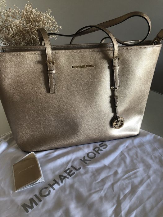Mala michael kors dourada