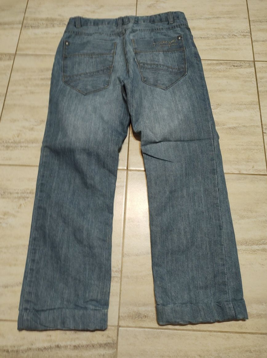 Spodnie dżinsowe ocieplane 146