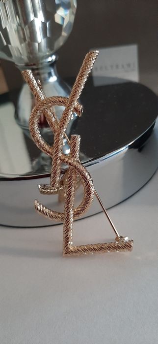 Złota broszka ysl model Opyum Cudo lv cc