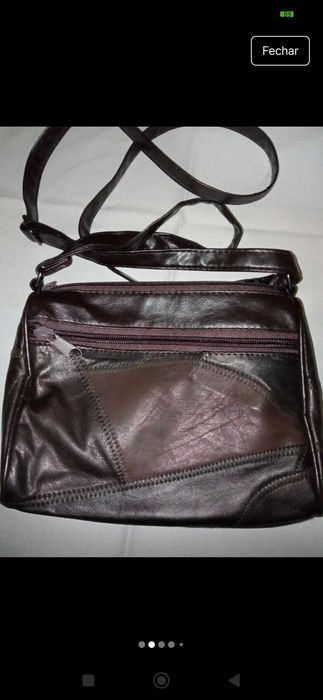 Mala à tiracolo ideal para passeios ao ar livre consultar a descrição.