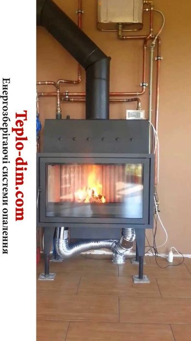 Каміни топки з водяним контуром.Водяним теплообмінником.Продаж,монтаж.