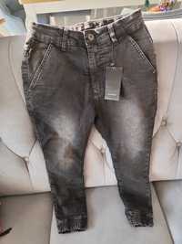 Nowe spodnie joggery jeansy Reserved z podszewką 146 cm