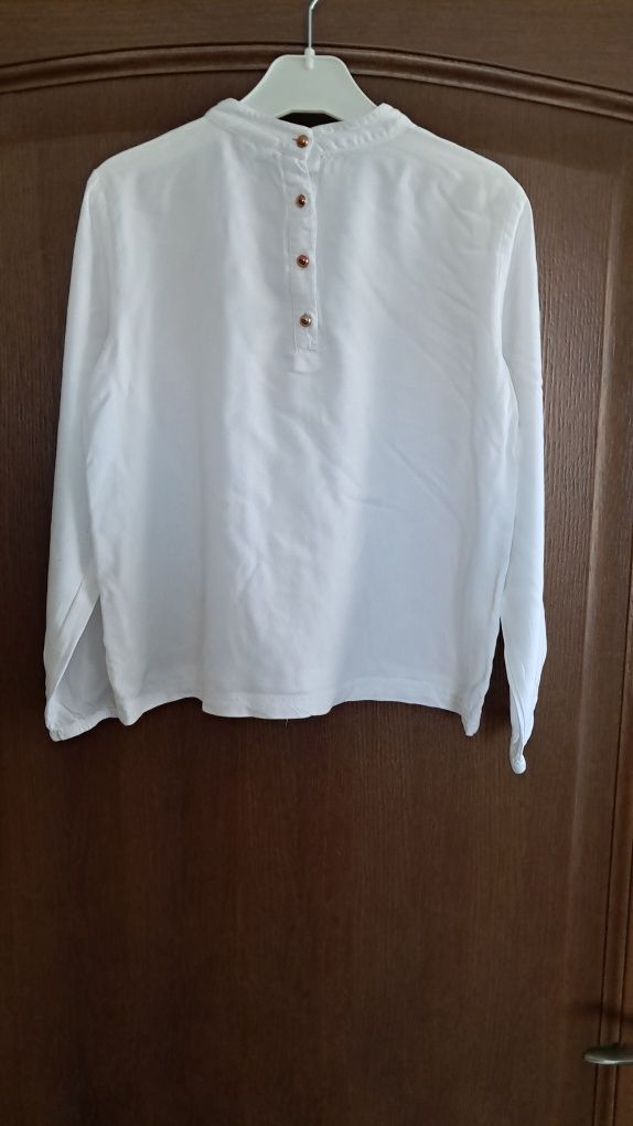 Elegancka biała bluzeczka Coccodrillo 134