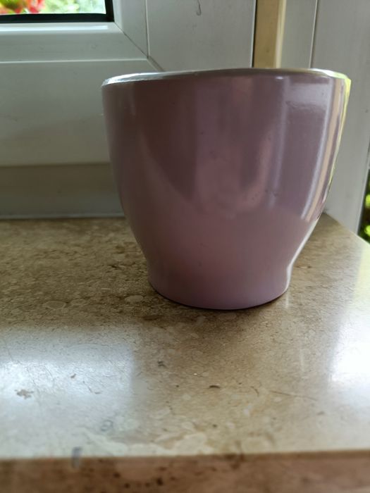 Mała osłonka na doniczkę różowa.