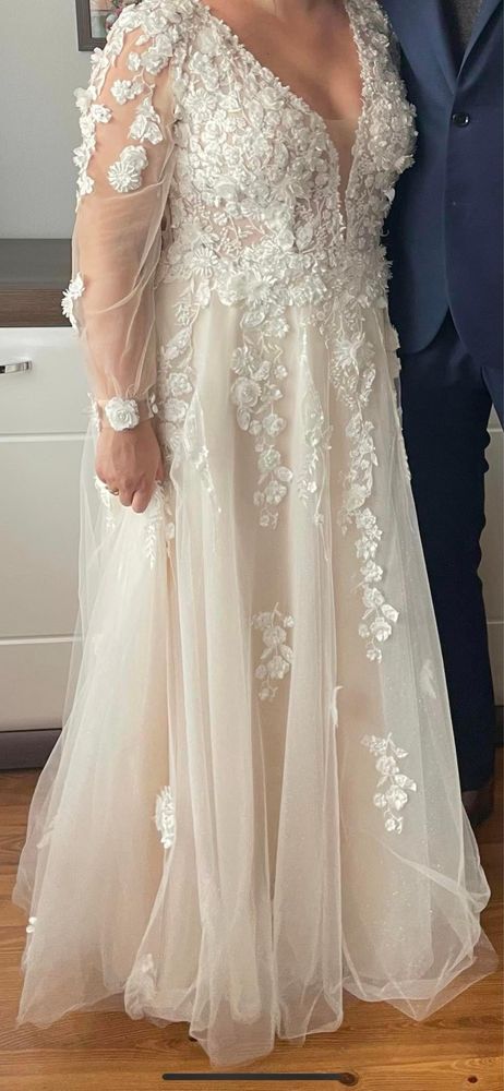 Suknia ślubna z rekawem