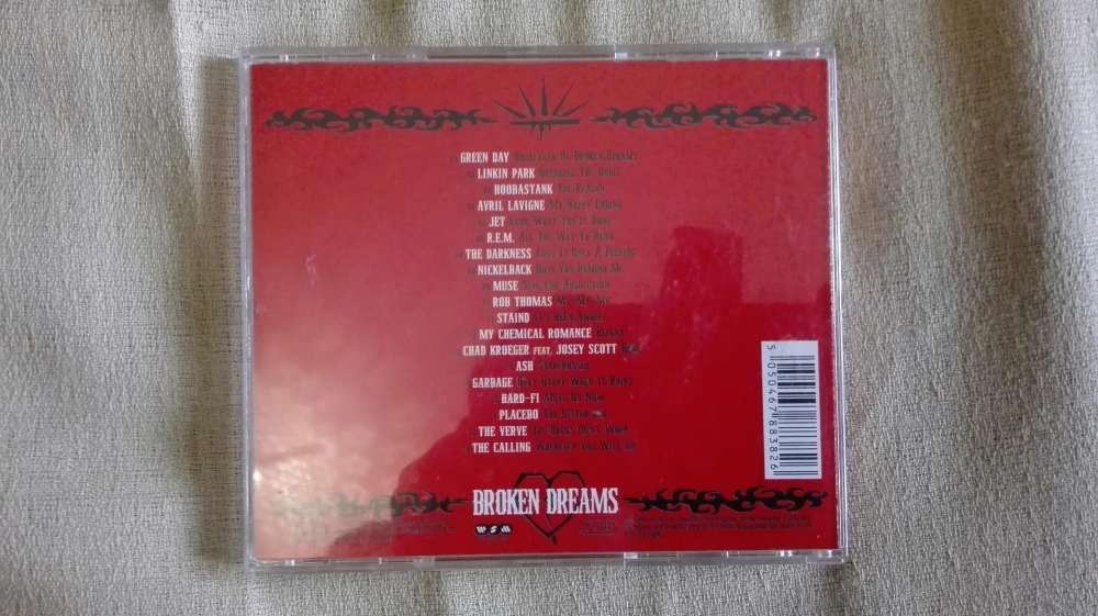 CD coletânea "Broken Dreams" em optimo estado de 2005.