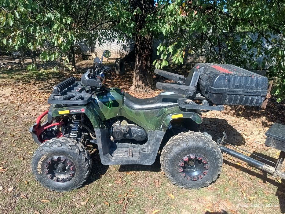 Квадроцикл з прицепом