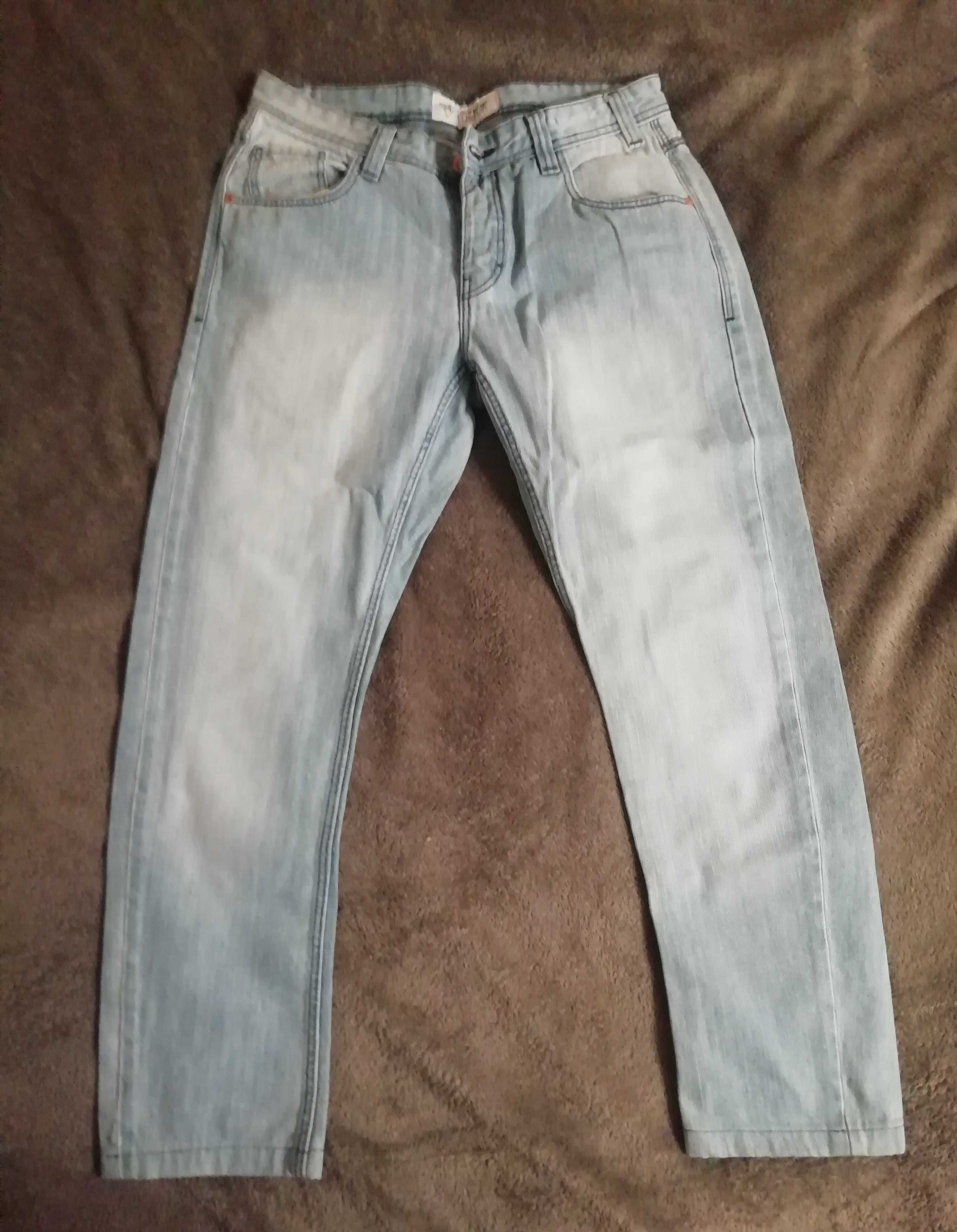 Męskie jeansy W31 L32