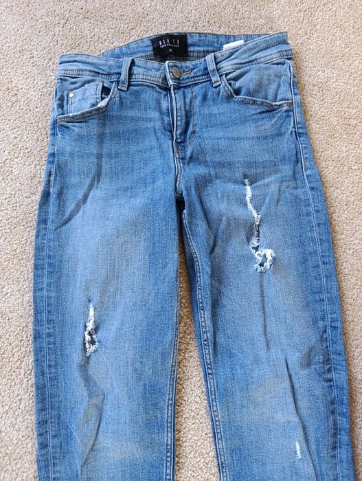 Spodnie jeansowe z dziurami mohito rozm 32