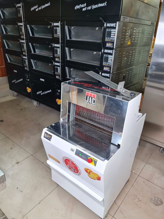 Хлеборезка хлiба и сухарикiв Хліборізка JAC Neu из Германии автомат