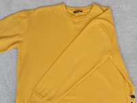 Жовтий пуловер з зав'язками по боках