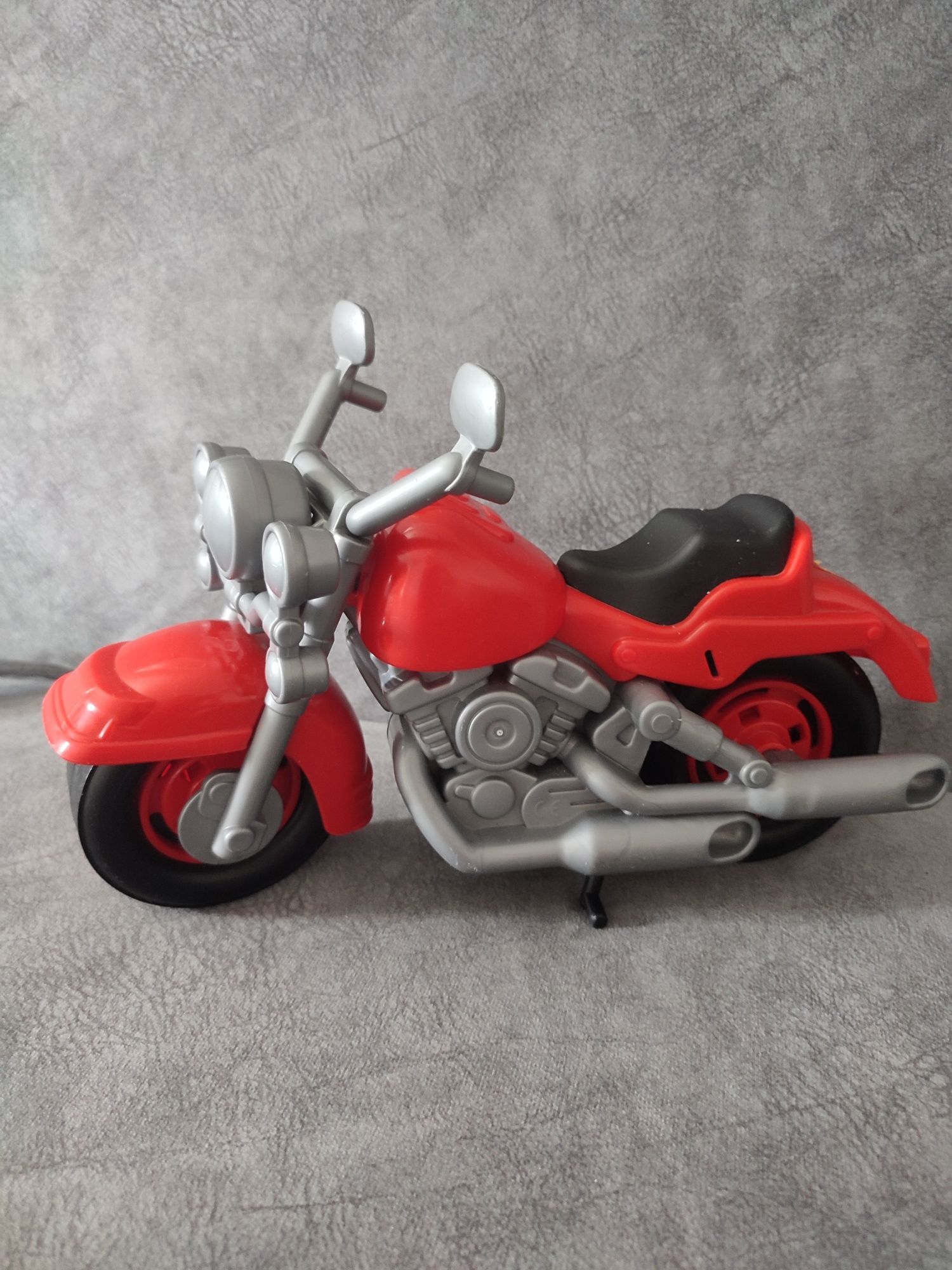 Детская игрушка мотоцикл.