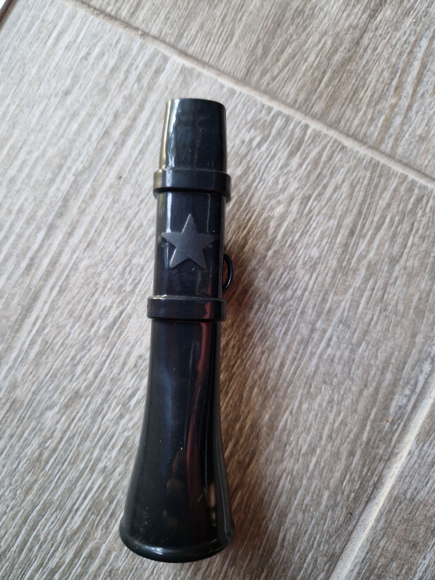 Instrumento musical.  Kazoo. Novo
