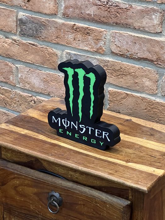 Monster logo stojące