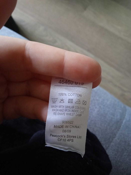 Dłuższy sweterek na guziki 34/36 czarny sweter klasyczny z kieszonkami