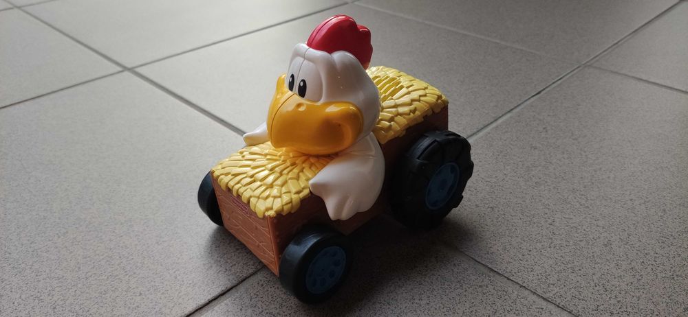 Kurczak firmy Fisher Price Potrząśnij i jedź