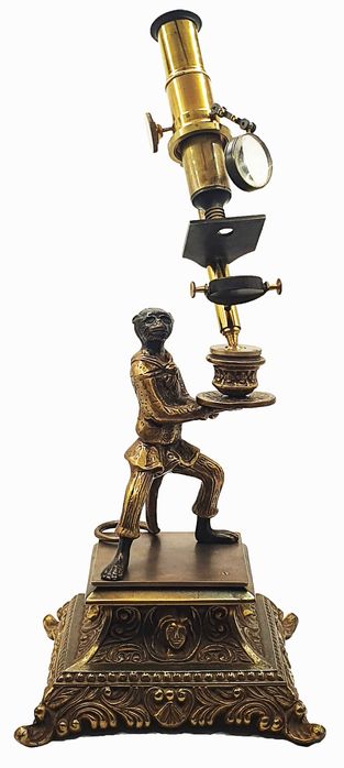 Brass reproduction of a “monkey microscope”