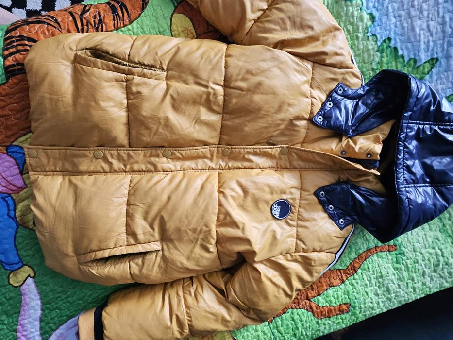 Продам куртку пуховую на мальчика
