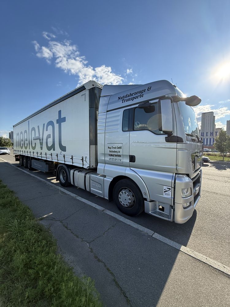 MAN TGX 18.440 Евро 6 2014 р.Причіп SCHMITZ