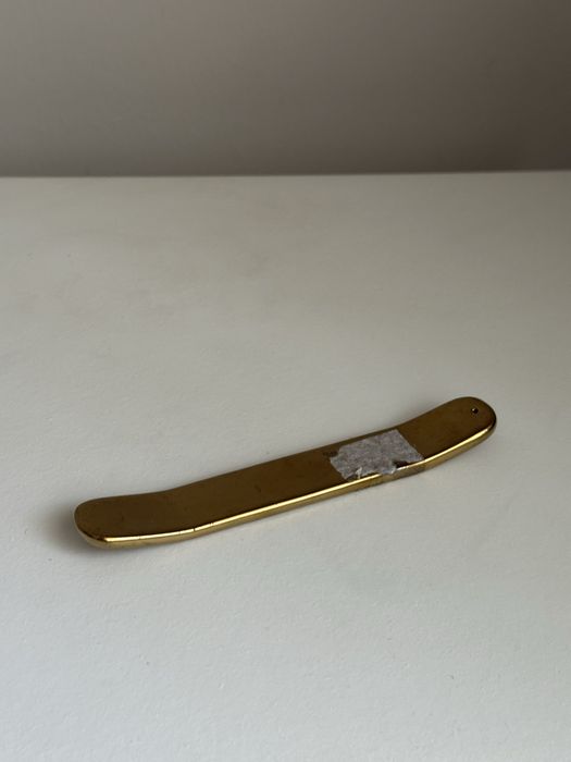 Porta incenso dourado