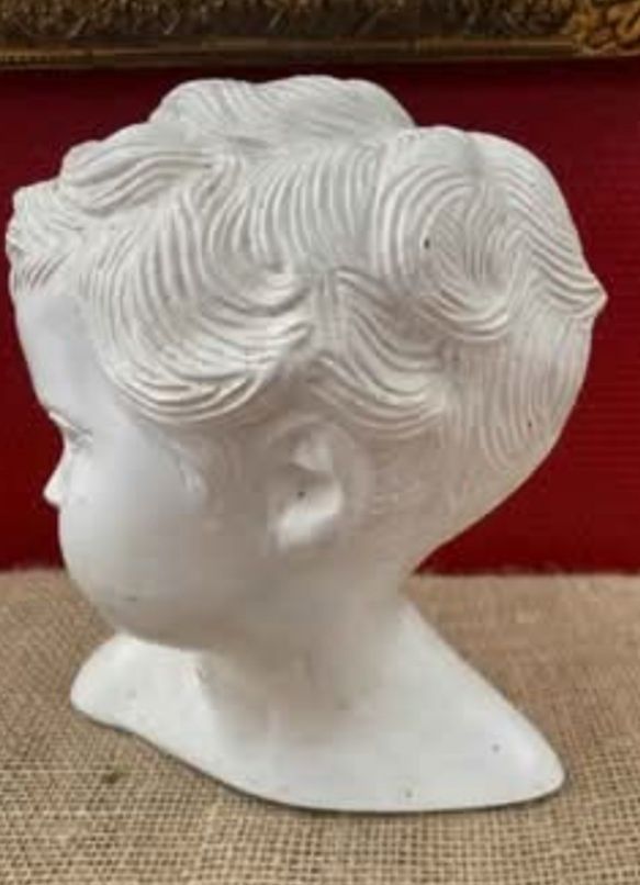 Moldura vintage e estatuetas desde 20€