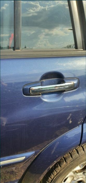 Suzuki Grand Vitara klamka chrom