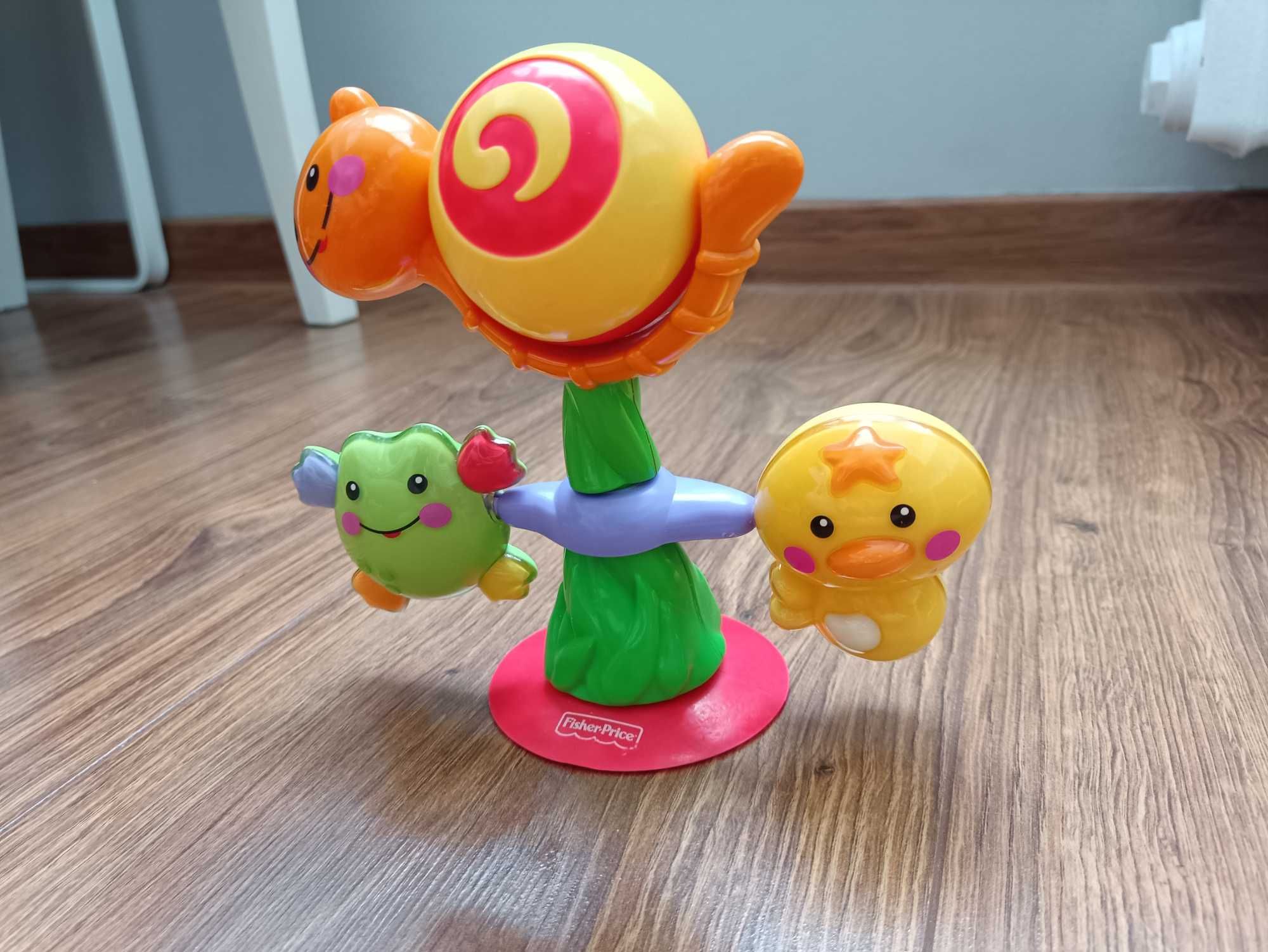 Fisher Price zabawka kręciołek z przyssawką, ślimak