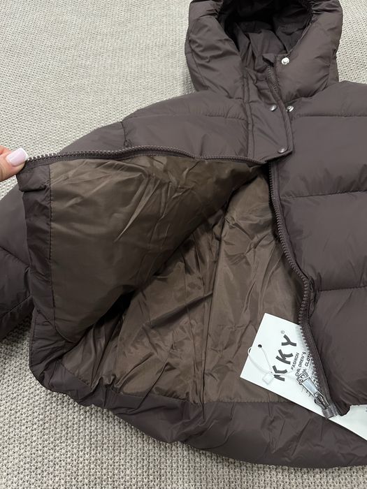 Коричнева куртка пуховик як zara