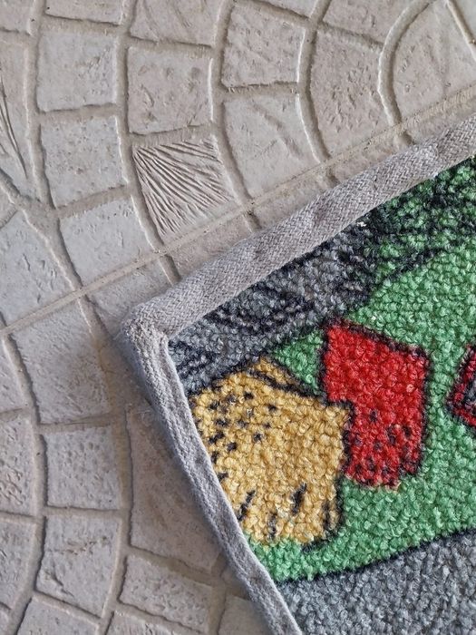 Tapete infantil com base impermeável