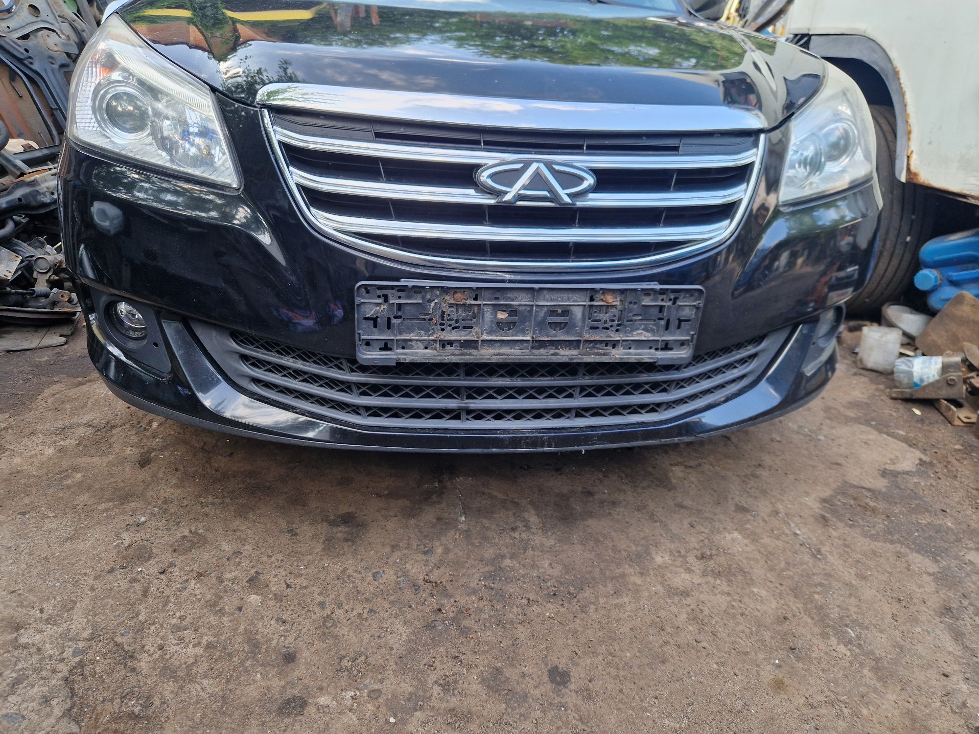 Разборка Chery E5