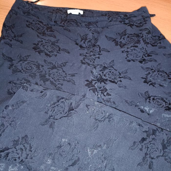 Пакетом джинси/штани жіночі