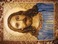Ковровое покрытие с изображением Иисуса Христа.