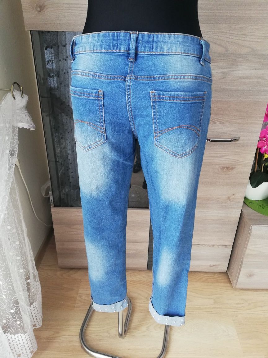 Spodnie jeansowe z koralikami na mankiecie Blue Motion r. 40
2 kieszen