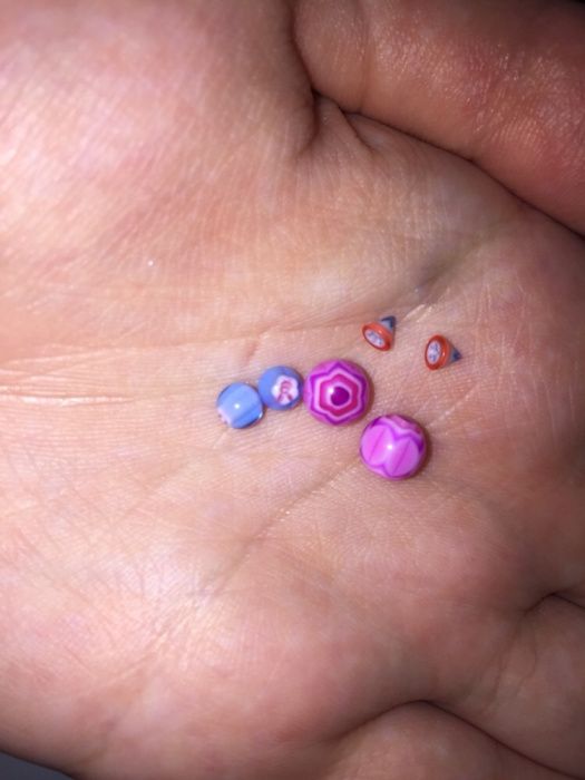 Piercings novos rosa. preto e dourado