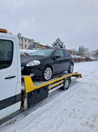 Transport pomoc drogowa holowanie wynajem lawety autolaweta wypożyczal