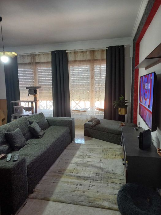 Sofá cama e repousa pés