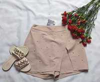 Krótkie spodenki spódnico spodnie z perełkami eleganckie pudrowy róż M