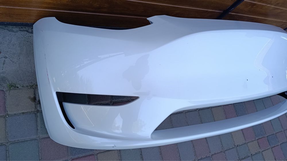 Бампер передній tesla model y 23- ev50402