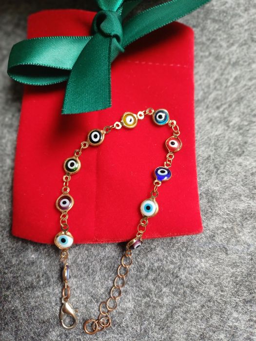 Novo! Pulseira olho grego+ bolsa veludo !